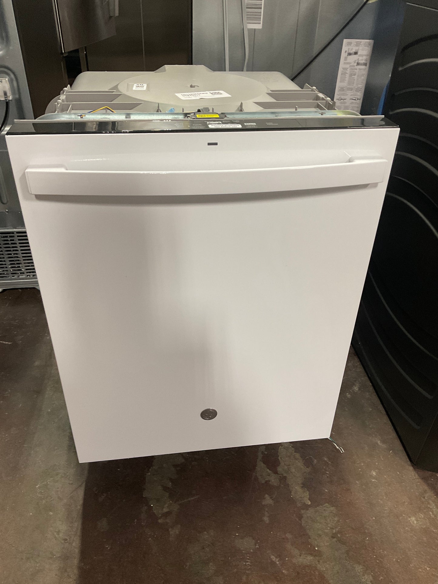 GE GE® ENERGY STAR® Top Control with Plastic Interior Dishwasher with Sanitize Cycle & Dry Boost