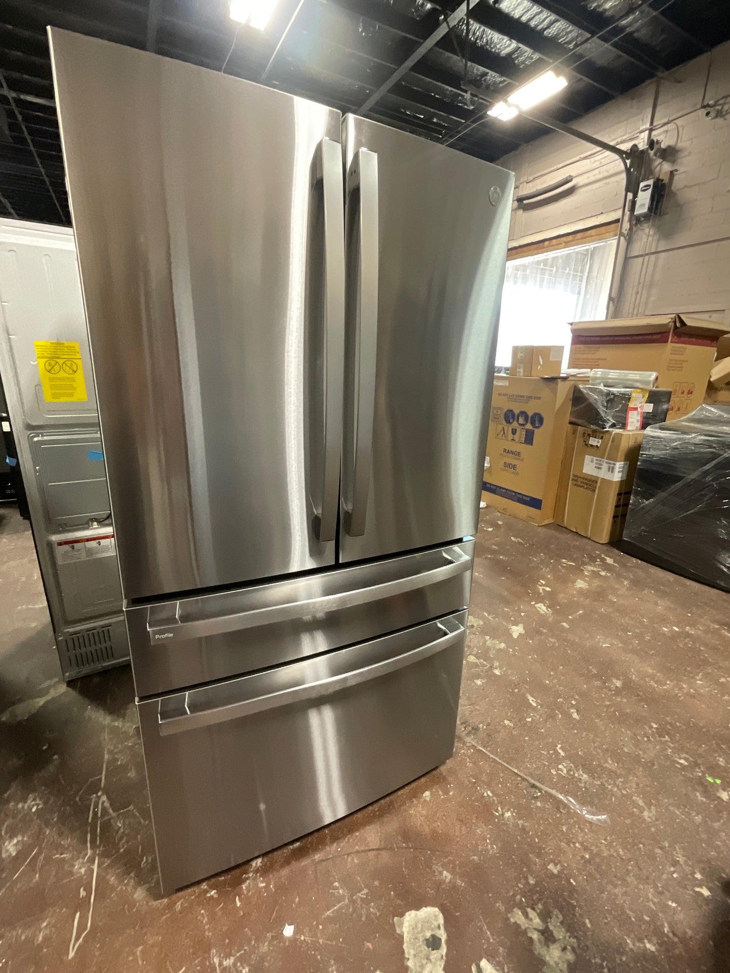 GE Profile™ ENERGY STAR® 23.2 Cu. Ft. Smart Counter-Depth Fingerprint Resistant 4-Door French-Door Refrigerator