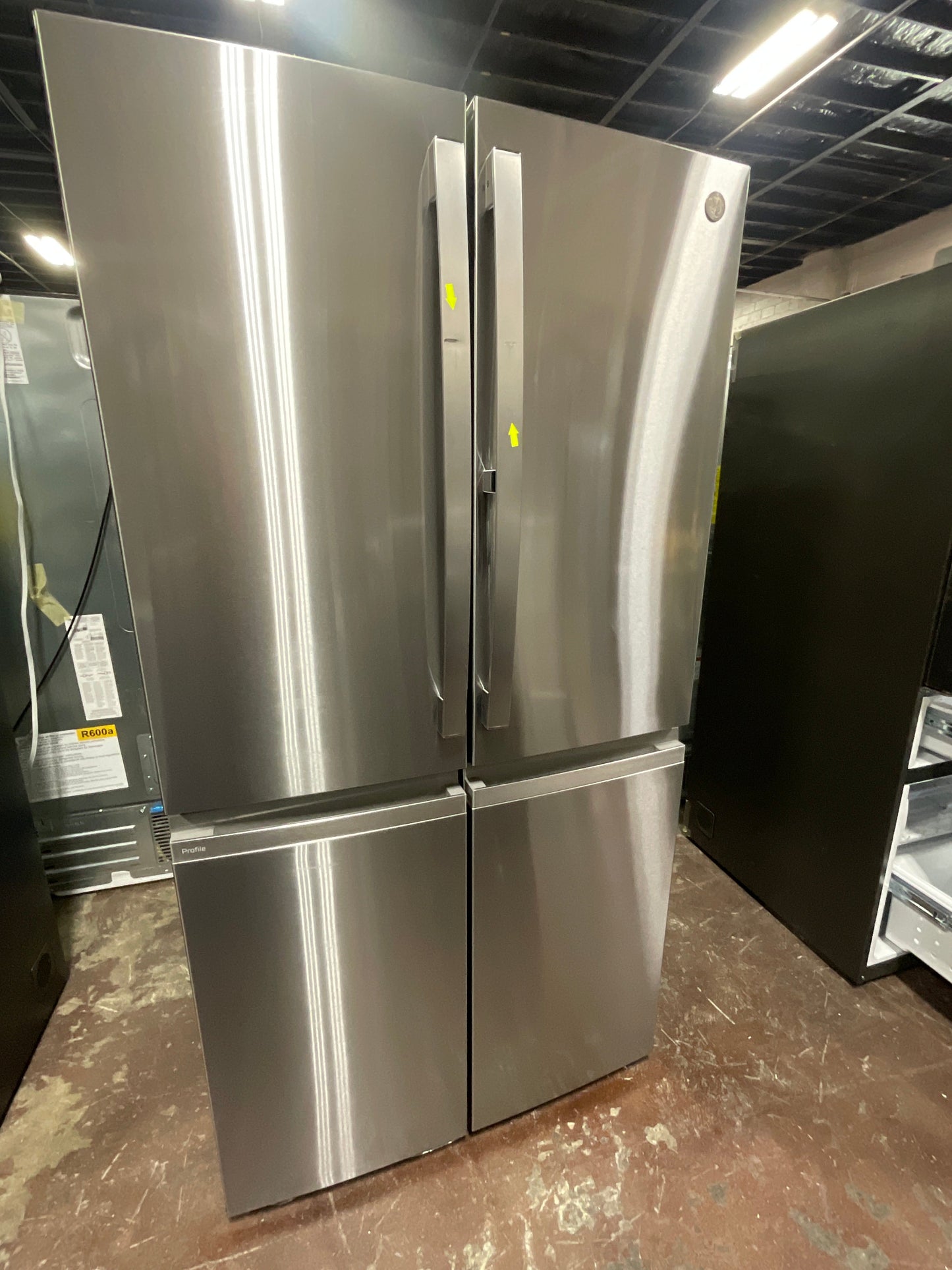 GE Profile™ ENERGY STAR® 22.9 Cu. Ft. Counter-Depth Quad-Door Refrigerator with Dual-Dispense AutoFill Pitcher and Door in Door