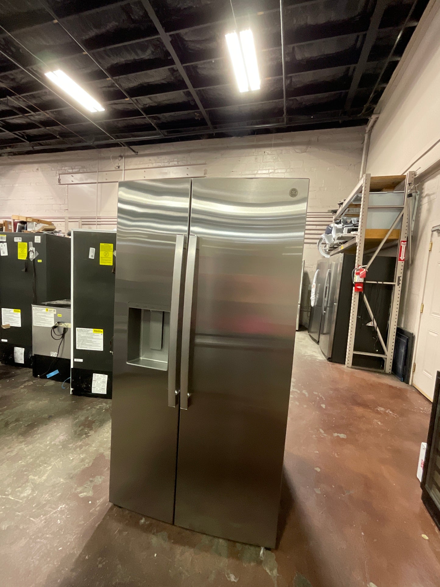 GE® 27.9 Cu. Ft. Side-By-Side Refrigerator with Extra Tall Dispenser and In-Door Icemaker